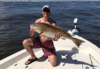 Man Posing with His Catch